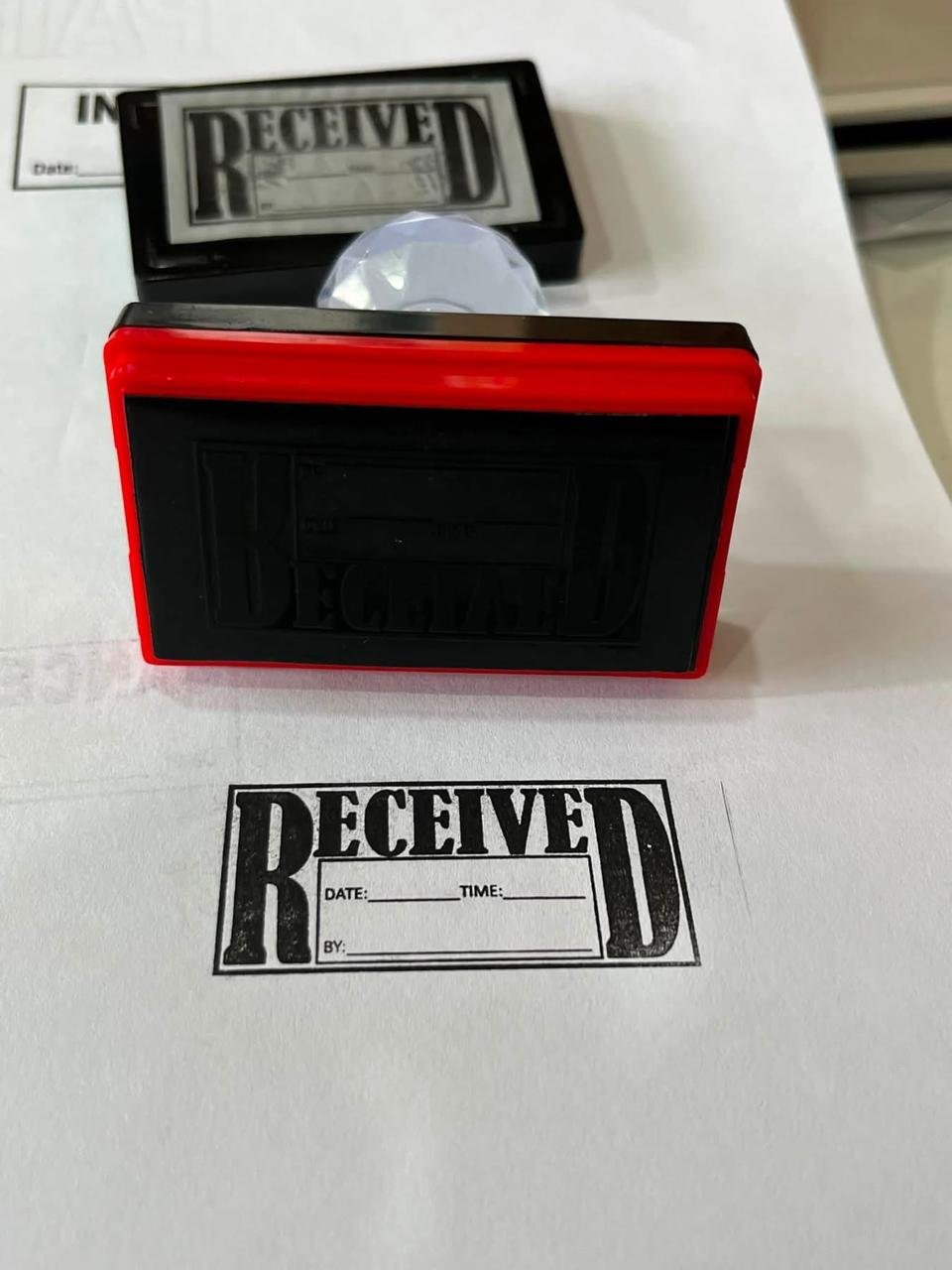 RECEIVED stamp impression with date and time fields